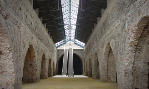 Caixa Forum en Atarazanas de Sevilla Diseño interior de escaleras mecánicas de Cruz y Ortiz Arquitectos